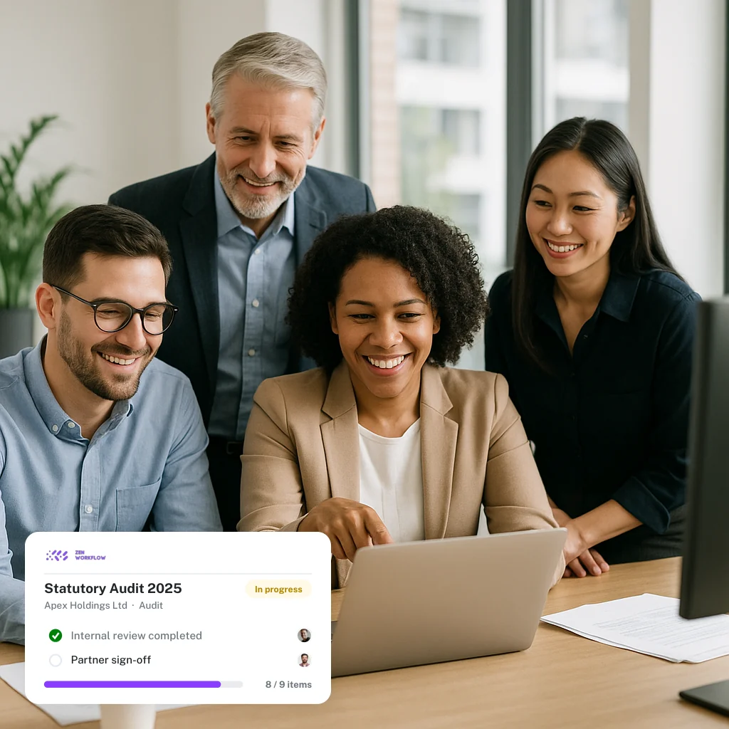 Professional services team working together at a laptop